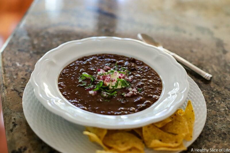 Flaco's Mexican Steak House Black Bean soup with minced onions