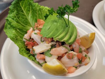 Flaco's Ceviche is Florida Grouper and Shrimp seasoned/ Marinated in Lime Juice and Tomato, fresh red onion and avocado. Made the pure homemade way