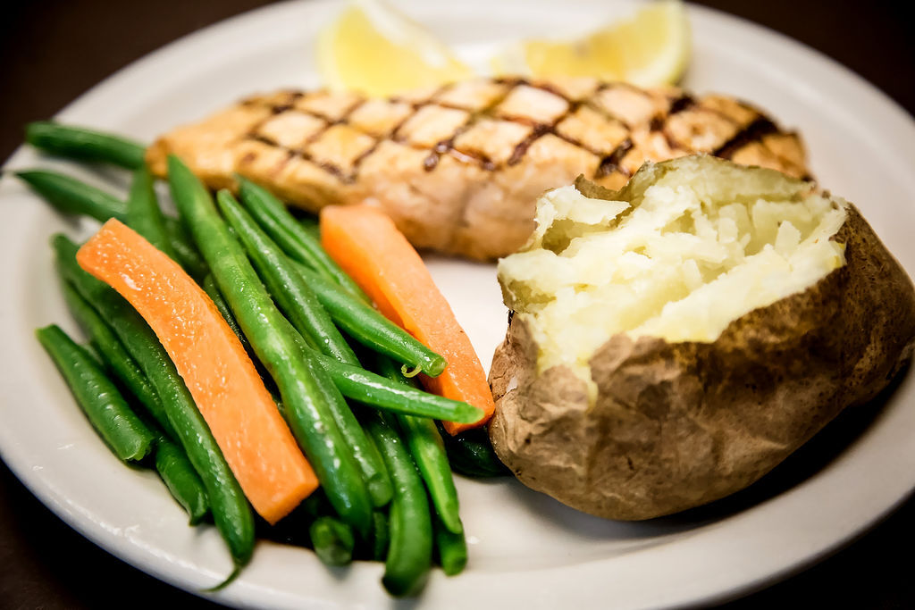 › Fresh Filet of Salmon**. Choice of Rice or Baked Potato and Sauteed Green Beans and Carrots for dinner in Naples