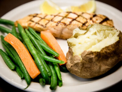 › Fresh Filet of Salmon**. Choice of Rice or Baked Potato and Sauteed Green Beans and Carrots for dinner in Naples