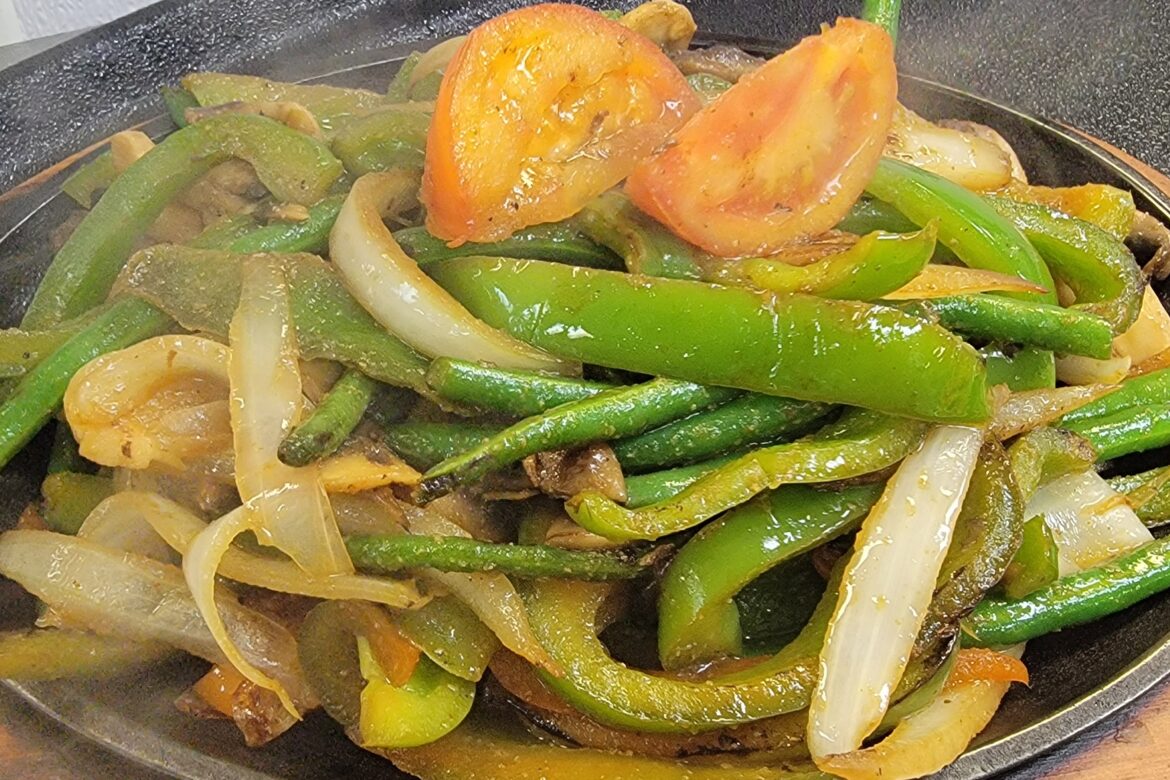 Fajitas Vegetarianas (Vegetarian Fajitas) is a Generous Portion of Fresh Sautéed Vegetables, Green Beans, Green Peppers, Onions, Mushrooms, Served Sizzling with Flour Tortillas, Guacamole, Sour Cream, Rice and Refried Beans. Add more below, OLE Flaco's of southwest florida! Choose the cook