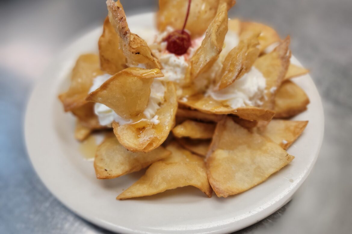 Sopapillas is Puff Pastry Topped with Cinnamon, Honey and Scoop of Vanilla Ice Cream-OLE Flaco's restaurant in naples florida