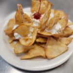 Sopapillas is Puff Pastry Topped with Cinnamon, Honey and Scoop of Vanilla Ice Cream-OLE Flaco's restaurant in naples florida