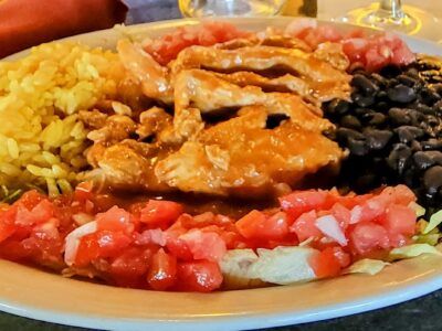 › Juicy Marinated Chicken Sautéed in Chef Luis’ Spicy Chipotle Pepper Sauce, with Rice and Refried Beans. Mexican Restaurant with the best House made Chipotle Sauce