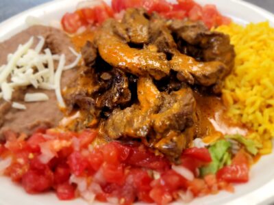 › Juicy Marinated Steak Sautéed in Chef Luis’ Spicy Chipotle Pepper Sauce, with Rice and Refried Beans. Mexican Restaurant with the best House made Chipotle Sauce
