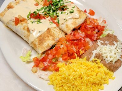 Flaco’s Burritos Flaco’s Burritos › Two Burritos with a choice of Protein. Mushroom, Onion, and Black bean stuffed, Served with Rice and Refried Beans. Flacos restaurant is just a short drive from Bonita Springs to Naples